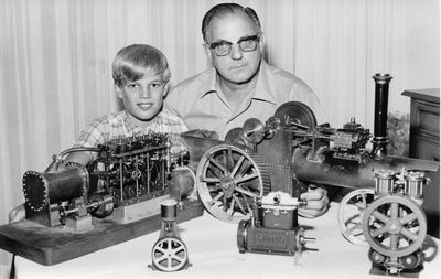 Bill Knight and son Brad show off a model steam locomotive