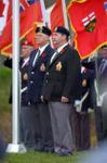 Georgetown Legion members in front of Flag Poles