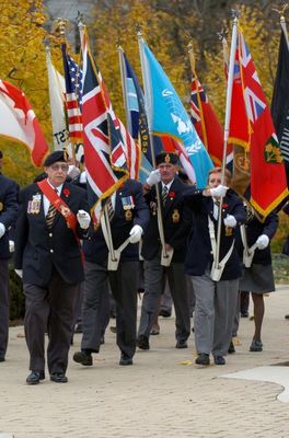 The Colour Party marches into Remembrance Park