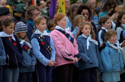 The Girl Guides participate in the Remembrance service.