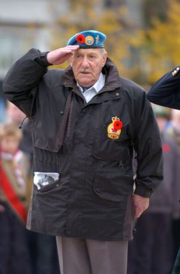 Charles Tutty salutes during the Remembrance service