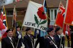 The Royal Canadian Legion Colour Party marches off at the conclusion of the Remembrance service