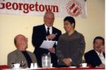 Bryan Lewis and a woman at a Georgetown Hockey Heritage Council event