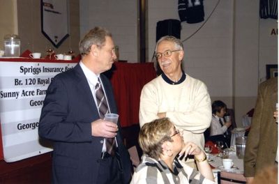 Don Norton conversing at a Georgetown Hockey Heritage Council event