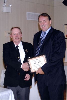 Steve Highfield being awarded a citation