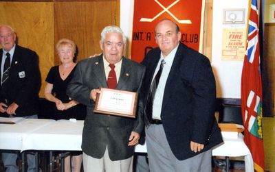 Al Walker receiving a Georgetown Hockey Heritage Council citation