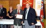 Al Walker receiving a Georgetown Hockey Heritage Council citation