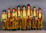 Eight boys from the Georgetown Skating Club dressed as Aladdin