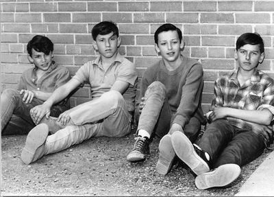 Wayne Aitchinson, Jimmy Davies, Ron Aitchinson and Rick Nicholl rest after completing the Wrigglesworth School Trip Walkathon