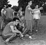 Baseball players launch a rally cry