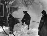 Georgetown Firefighters at work extinguishing burning mattress