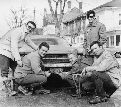 Georgetown Jaycees installing license plates