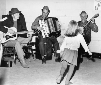 Irish stew ladled for St. John's Anglican Church St. Patrick's Day supper while Trio entertains