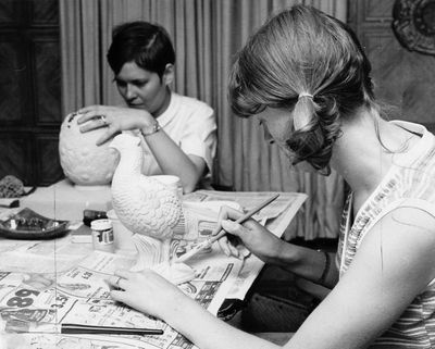 Two students learn ceramics at classes taught by Ellen Munro