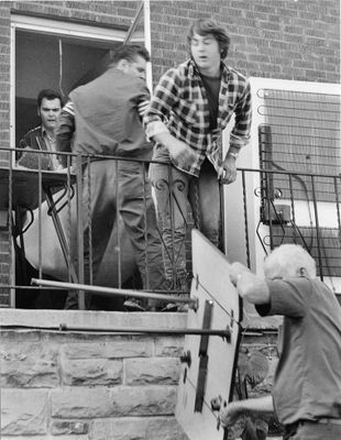 Residents help empty apartments at 34 John Street West