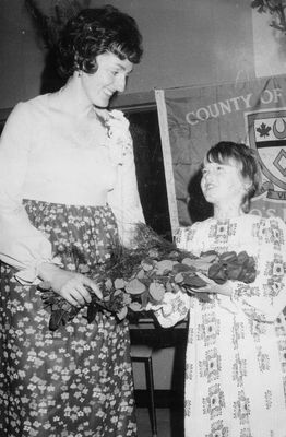 girl receiving flowers