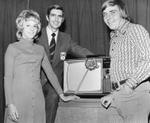 Howie and Lou Oram win a colour TV offered in a draw to cable subscribers