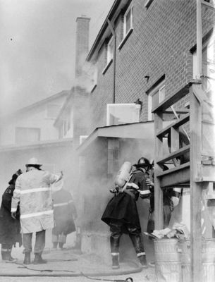 Georgetown fire crew after a fire on Wednesday at 34 John  Street West, which left nine families homeless