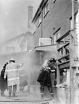 Georgetown fire crew after a fire on Wednesday at 34 John
Street West, which left nine families homeless