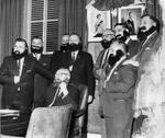 Town Councilors wear false beards, to replicate the “Fathers of Confederation”