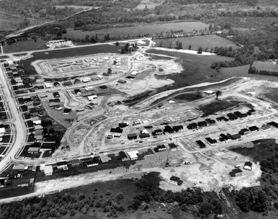 An aerial view of subdivision growth with Delrex Blvd.