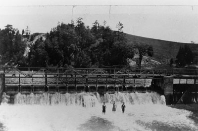 Swimmers below the dam