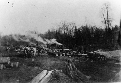 George Chisholm with steam saw mill