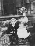 Two children on porch steps
