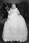 Baby in christening gown