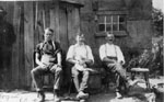 Three men on a bench at the Logan Quarry 1908