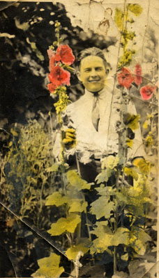 Hand tinted photo of a young man.