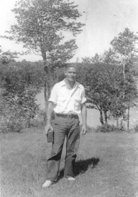 Man in front of the lake.