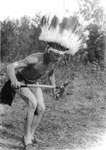 Man in Native headdress and loincloth, Two