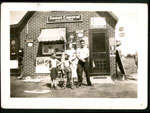 Family in front of Hammel's Store