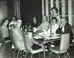 Mabel Vankoughnett serving dinner