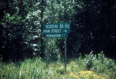 Population sign for town of Rosseau Road 1983