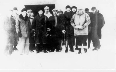 Group of Prospectors, One Man Holding Gold Brick