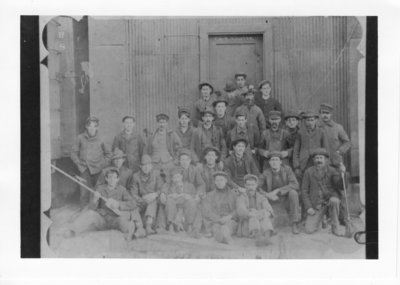 Workers in front of C.N.R. elevator