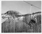 Skiers on Mount McKay Chair Lift