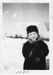 Photo of a child outside on a winter day