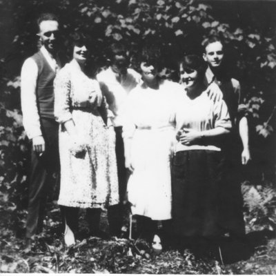 Unidentified people having a picnic at the shack