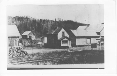 Farmer's Mercantile Store. Old school in background. Taken in early 30's in Nolalu