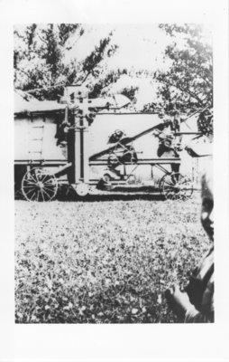 Threshing grain in Nolalu