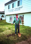 Don Harvey plants a tree for Canada Day