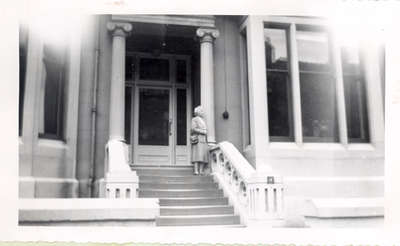 Agnes on the steps of Clenendey Hotel