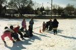 Students Playing Tug of War with Bonhomme