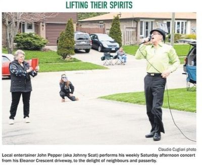 Local Entertainer Performs for Neighbours in Driveway