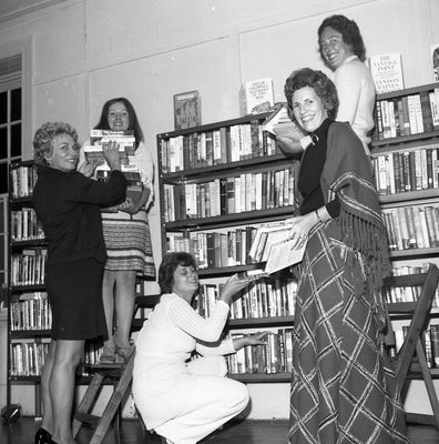 Shelving books at the new Esquesing Township Library