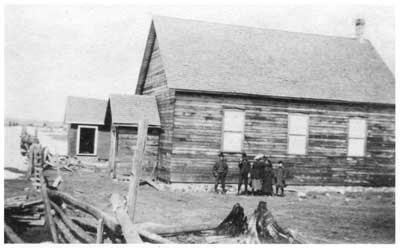 Wooden building and people, Circa 1900