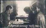 Nikolai Bokan and two of his sons prepare a memorandum.